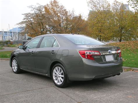 2014 Toyota Camry Hybrid XLE Road Test Review | The Car Magazine