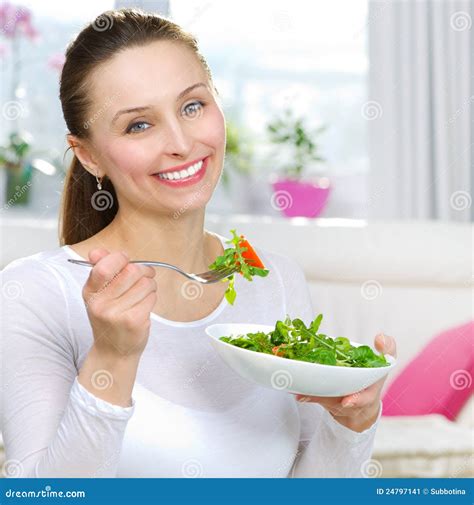 Woman Eating Salad Stock Image - Image: 24797141