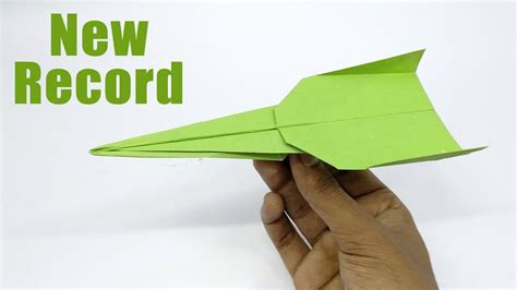 Folding A Paper Plane With Origami - Origami