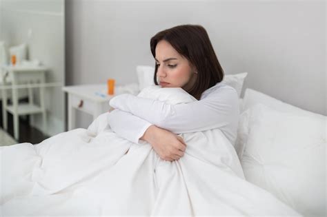 Premium Photo | Unwell young woman suffering from flu at home