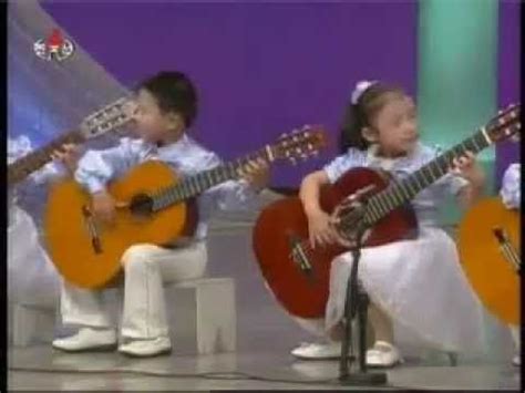 North Korea Kindergarten children Playing the Guitar of North Korean music | Korean music, North ...