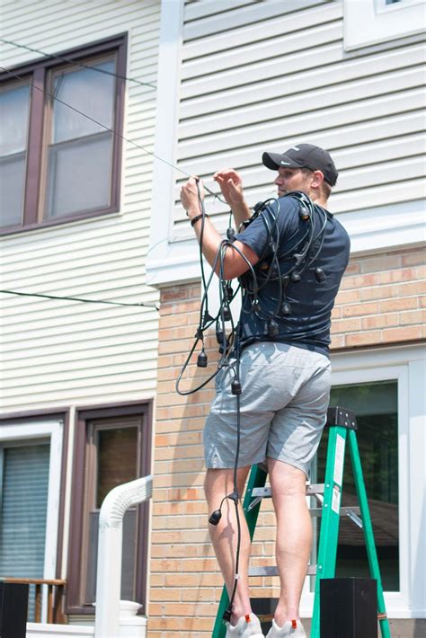 How to Install String Lights from House to Garage | The DIY Playbook