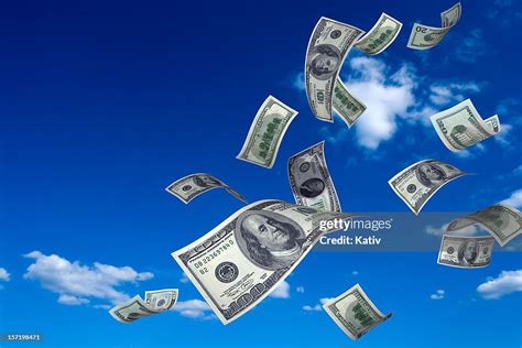 Money Falling From Sky High-Res Stock Photo - Getty Images