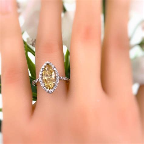 2.29 Carat Fancy Yellow Marquise GIA Diamond Engagement Ring 18 Karat For Sale at 1stDibs