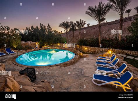 Evening view for luxury swimming pool in night illumination Stock Photo ...