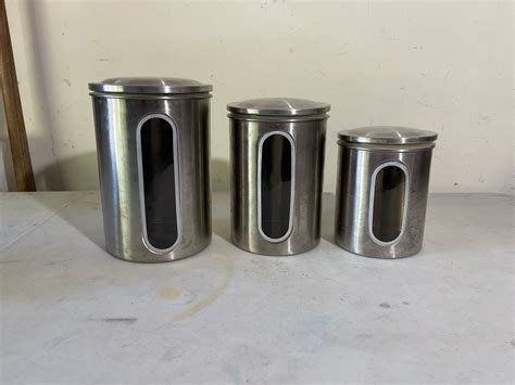 Lot - stainless steel canister set