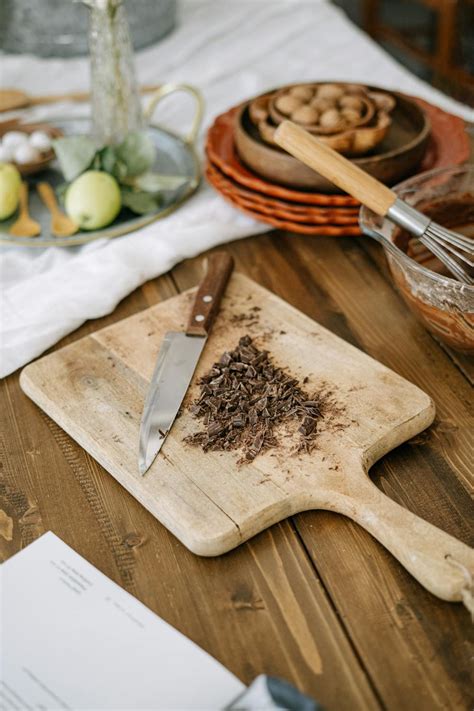Brown Wooden Spatula on Brown Wooden Chopping Board · Free Stock Photo
