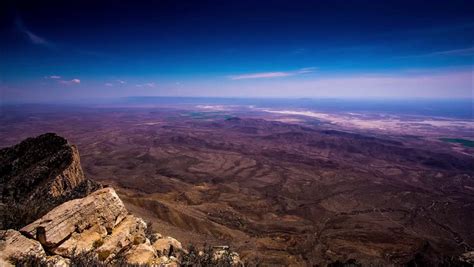 Guadalupe Peak, View From The Summit Facing South West As Dirt Devils Blow Across Plains Below ...