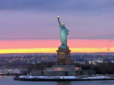 Statue of Liberty at sunset Photograph by Mircea Veleanu