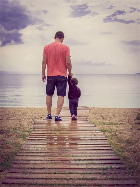 Father and son picture beside body of water HD wallpaper | Wallpaper Flare