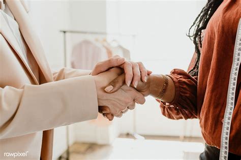 Two women shaking hands in a boutique | premium image by rawpixel.com / McKinsey | Business ...