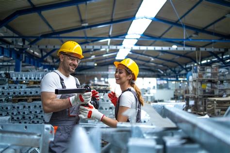 Free Photo | Factory workers in industrial production hall