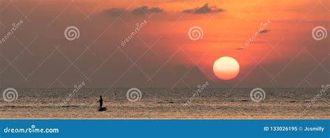 Beautiful Panoramic Tropical Beach Sunset with Golden Lights Ba Stock Image - Image of people ...