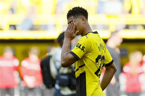 Jude Bellingham pushes camera away in tears as Borussia Dortmund ...