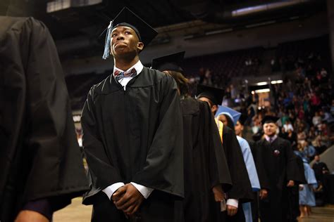 Vista Ridge High School graduates prepare for a commencement ceremony ...