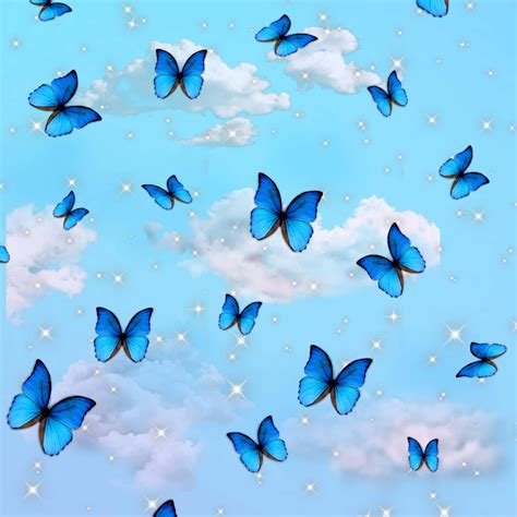 Download A Blue Butterfly sailing across a serene summer sky | Wallpapers.com