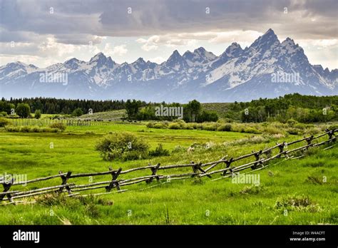 Mount Moran and the Grand Teton mountains at dusk seen across the Moose ...