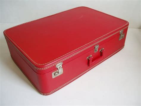 Red suitcase | Blue interior, Suitcase, Props