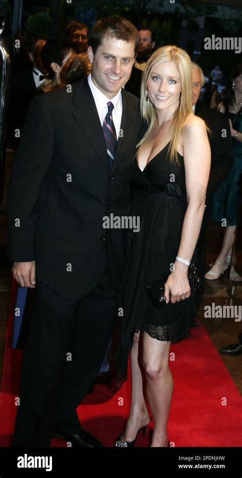 Australia's Simon Katich, left, and Georgie Willis arrive at the IIC Awards in Sydney, Australia ...