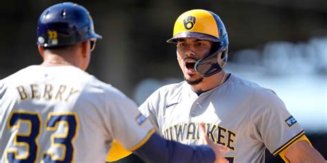 Brewers score three in the eighth to complete comeback over Cubs