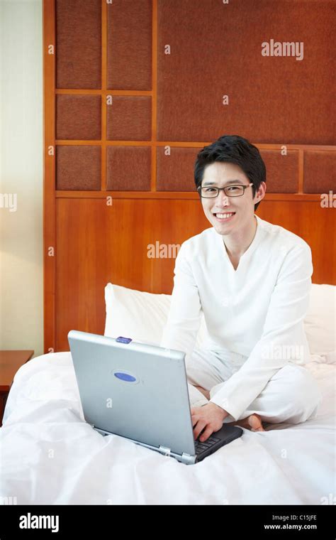 man working on the bed Stock Photo - Alamy