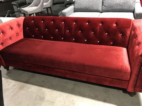 RED VELVET UPHOLSTERED JEWELED SOFA - Able Auctions