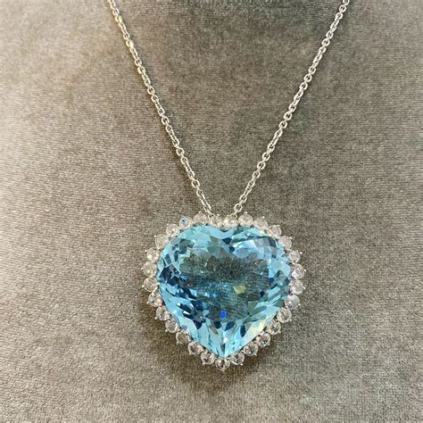 Heart Aquamarine and Diamond Pendant | Fancy jewelry, Fancy jewellery, Jewellery sketches