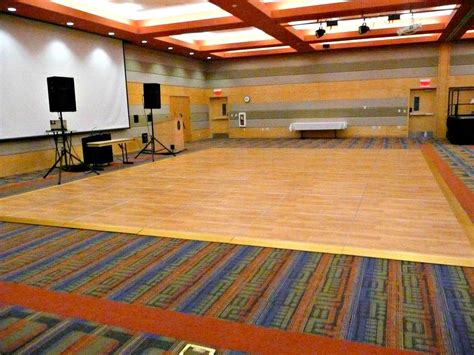 Portable dance floor in the UC Ballroom | Portable dance floor, Dance floor, Wellness design