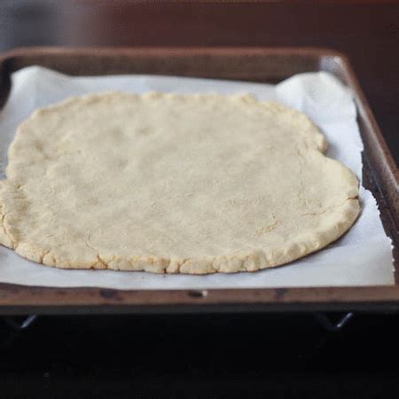 GF Pizza Crust Very easy to make I formed the crust in the pan. It falls apart, just put it bac ...