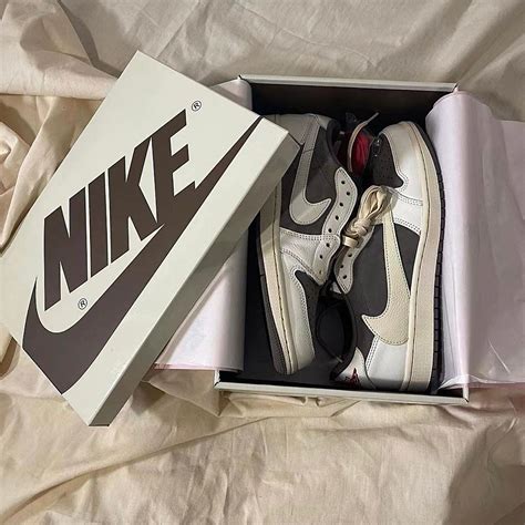 Travis Scott Air Jordan 1 Low OG Reverse Mocha DM7866-162 Release Date | SneakerNews.com