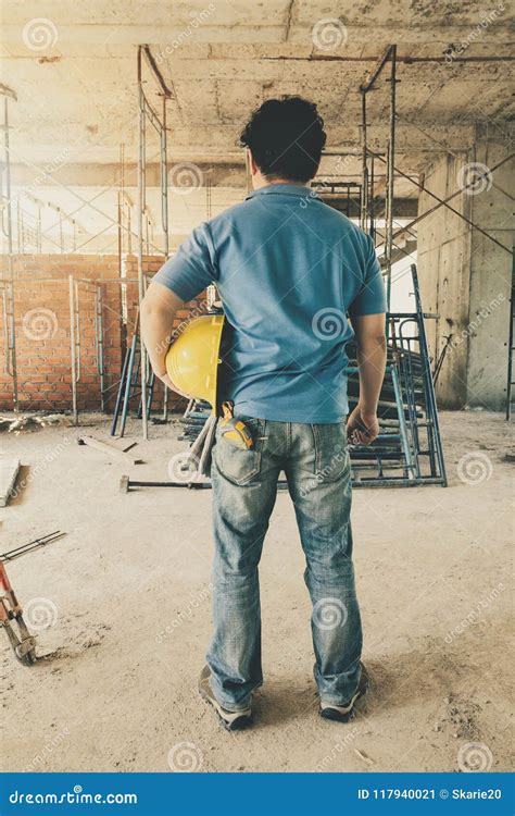 Construction Worker with Helmet in Construction Site Stock Image ...