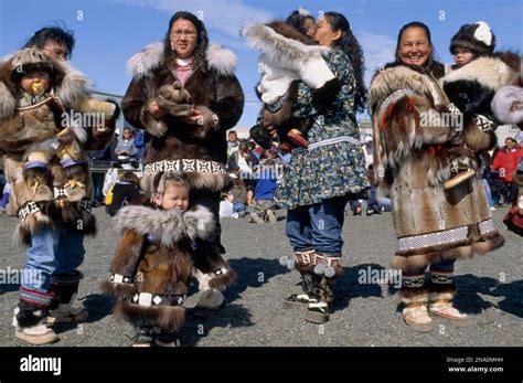 An Inuit gathering, showing traditional clothing Stock Photo - Alamy