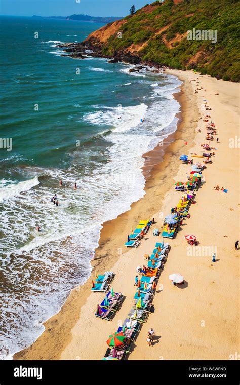 top view of beach in Goa India vagator beach. people taking sunbath on the beach on shacks Stock ...