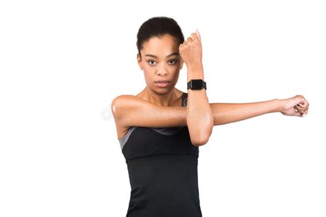 Determined Black Lady Exercising Doing Deltoid Arm Stretch in Studio ...