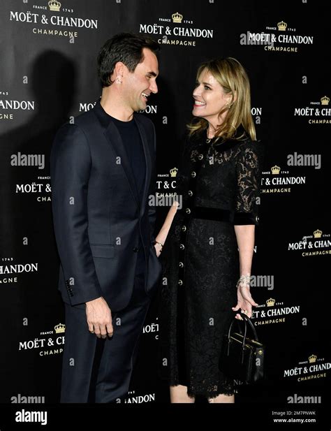 Roger Federer, left, and Savannah Guthrie attend the Moet & Chandon ...