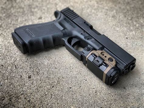 Glock 20 with Viridian X5L Weapon Light Glock Guns, Weapons Guns, Guns And Ammo, Armas Ninja ...