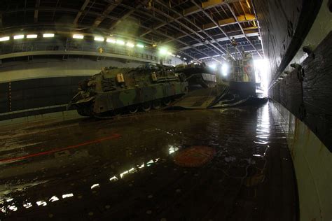 An M88A2 Hercules tank retriever tows an M1A1 Abrams - NARA & DVIDS Public Domain Archive Public ...