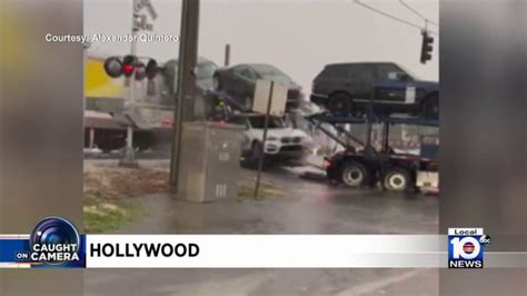 Brightline train slams into car carrier full of vehicles, causing mess in Hollywood