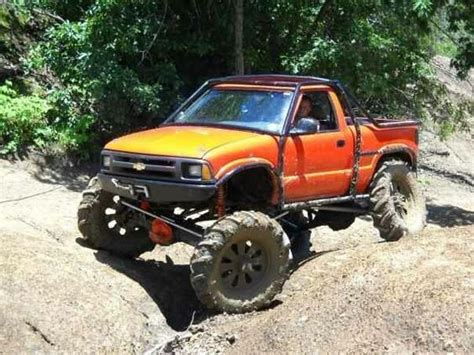 Chevy S10 single cab 4x4 lifted on full size width 1 ton straight axle exocage roll cage bar ...