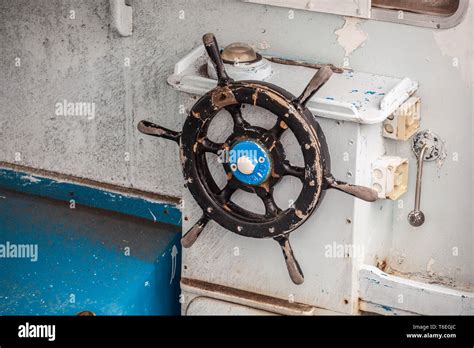 Vintage wooden boat steering wheel on an old vessel Stock Photo - Alamy