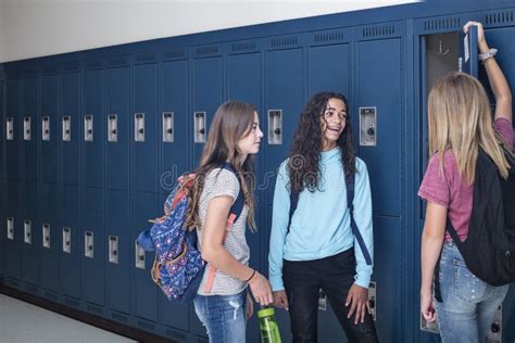 School Hallway With Lockers And People