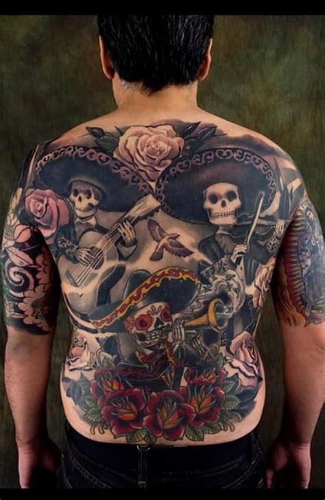 Stunning Black and White Mariachi Tattoo with Glow in the Dark Accents