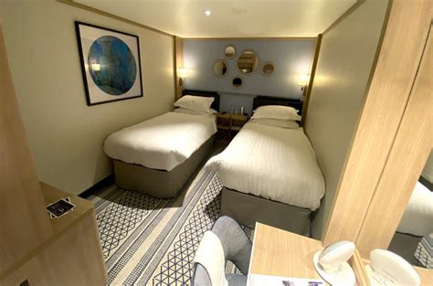 How Do Cruise Ship Cabins Compare to Hotel Rooms? - Emma Cruises