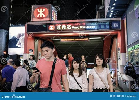 Passengers Commute at Mong Kok Station of the MTR System in Hong Kong ...