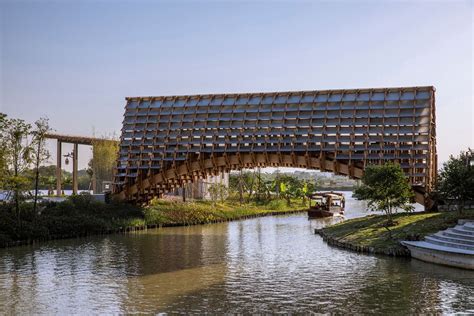 Gorgeous Timber-Covered Bridge Built at Chinese Eco-Cultural Resort