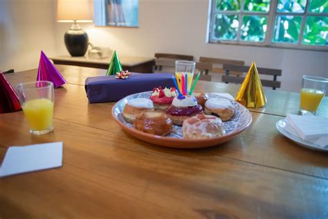 A Donut with Assorted Birthday Candles · Free Stock Photo