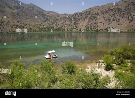 A pedal boat on the Lake Kournas / Crete / Greece Stock Photo - Alamy