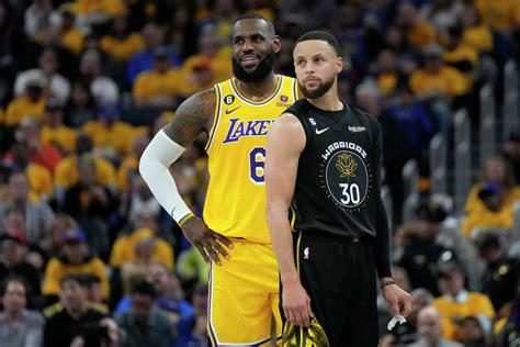 LeBron follows Steph Curry back to Warriors bench in weird moment