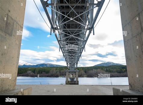 Johnsons Crossing, Teslin River steel Bridge on the Alaska Highway during spring summer time ...