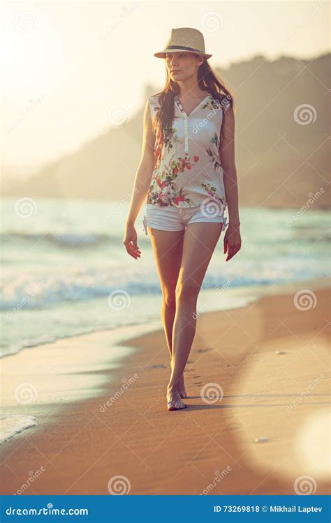 Walking Barefoot on the Beach Stock Photo - Image of barefoot, shore ...